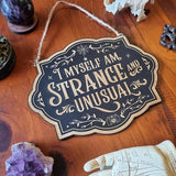 Strange & Unusual - Sign