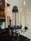 Skull four arm candle holder