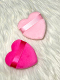 Two Heart shaped makeup puffs