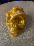 Skull with snakes ornament