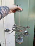 Skull four arm candle holder