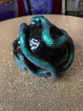 Skull with snakes ornament